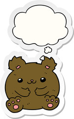 cartoon bear with thought bubble as a printed sticker