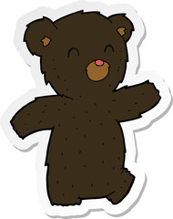 sticker of a cartoon black bear