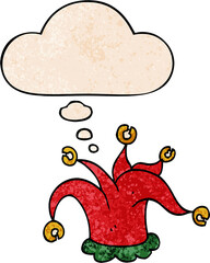 cartoon jester hat with thought bubble in grunge texture style