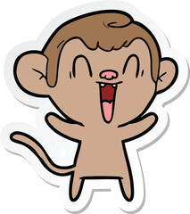 sticker of a cartoon laughing monkey