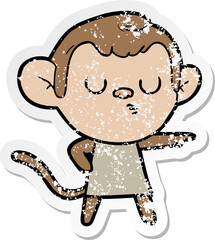 distressed sticker of a cartoon calm monkey