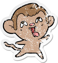 distressed sticker of a crazy cartoon monkey