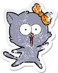 distressed sticker of a cartoon cat
