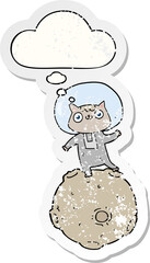 cute cartoon astronaut cat with thought bubble as a distressed worn sticker