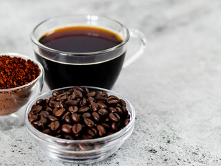 Close shot of coffee powder, coffee beans and black coffee with copy space.
