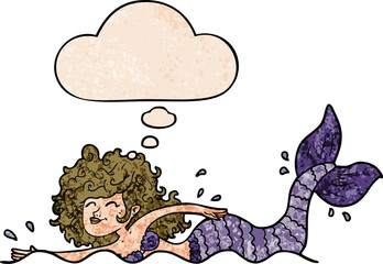 cartoon mermaid with thought bubble in grunge texture style