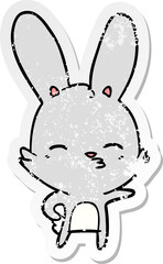 distressed sticker of a curious bunny cartoon