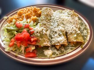 delicious green chili verde enchililadas