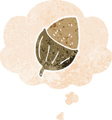 cartoon acorn with thought bubble in grunge distressed retro textured style