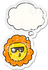 cartoon sunflower with thought bubble as a distressed worn sticker