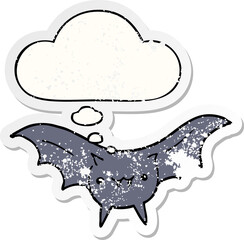 cartoon bat with thought bubble as a distressed worn sticker