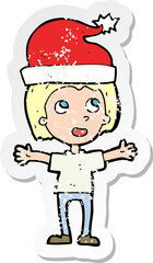 Fototapeta na wymiar retro distressed sticker of a cartoon boy in christmas hat