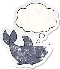cartoon shark with thought bubble as a distressed worn sticker