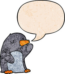 cartoon penguin with speech bubble in retro texture style