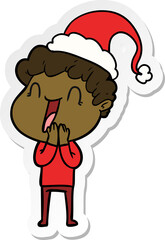 hand drawn sticker cartoon of a happy man wearing santa hat