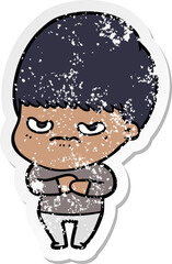 distressed sticker of a annoyed cartoon boy