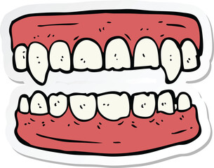 sticker of a cartoon vampire teeth