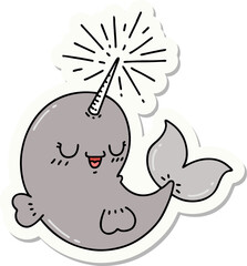 sticker of a tattoo style happy narwhal