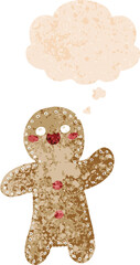 cartoon gingerbread man with thought bubble in grunge distressed retro textured style