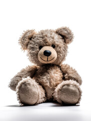 Old Teddy bear on a white background