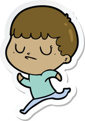 sticker of a cartoon grumpy boy