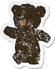 retro distressed sticker of a cute cartoon black bear