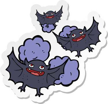sticker of a cartoon vampire bats