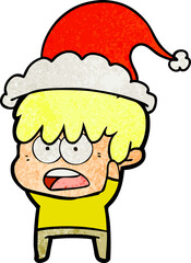 worried hand drawn textured cartoon of a boy wearing santa hat