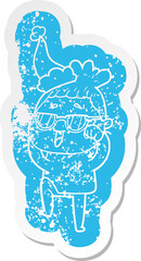 quirky cartoon distressed sticker of a happy woman wearing spectacles wearing santa hat