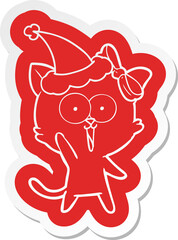 quirky cartoon  sticker of a cat wearing santa hat