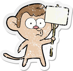 distressed sticker of a cartoon hooting monkey