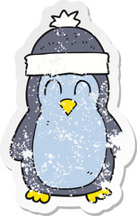 retro distressed sticker of a cartoon penguin