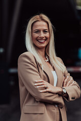 A powerful portrait of a businesswoman, standing confidently with her arms crossed, representing the determination of the female gender and embodying strength and success