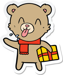 sticker of a rude cartoon bear with present