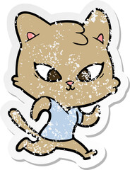 distressed sticker of a cute cartoon cat