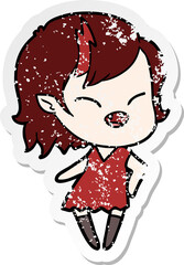 distressed sticker of a cartoon laughing vampire girl