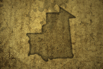 map of mauritania on a old vintage crack paper background .