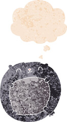 cartoon bear with thought bubble in grunge distressed retro textured style