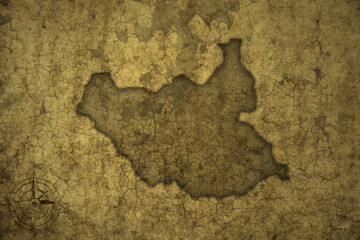 map of south sudan on a old vintage crack paper background .