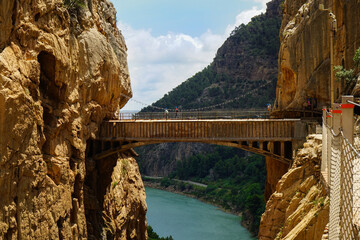 Caminito del Rey tibetan bridge in a spring day, Guadalhorce river, Desfiladero de los Gaitanes, El...