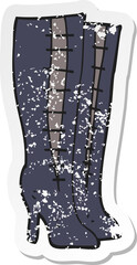 retro distressed sticker of a cartoon high boots