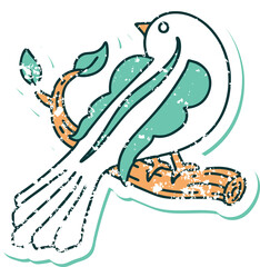 iconic distressed sticker tattoo style image of a bird on a branch