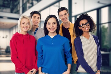 Group of happy university friends in class