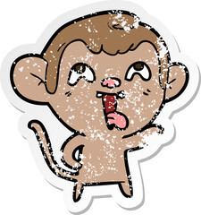 distressed sticker of a crazy cartoon monkey