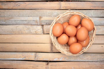 Chicken eggs in a wicker basket