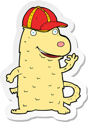 sticker of a cartoon dog wearing cap