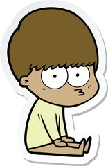 sticker of a curious cartoon boy