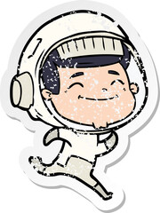 distressed sticker of a happy cartoon astronaut