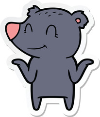 sticker of a smiling bear shrugging shoulders