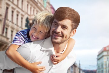 Fototapeta na wymiar Happy young father with child have fun